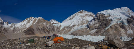 EVEREST BASE CAMP, NEPAL, 20 October 2018 - View from Mount Everest base camp, tents and prayer flags. A lot of tourists on a popular treck. Sagarmatha National Park, trek to Everest base camp - Nepalのeditorial素材