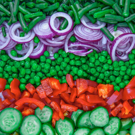 Fresh chopped vegetables bright background