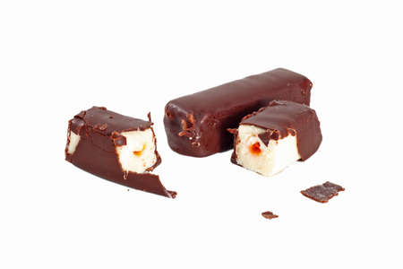 Broken Cottage cheese rod with chocolate isolated on whiteの写真素材