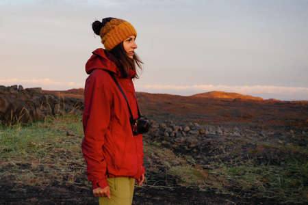 Woman traveling Iceland. In famous place between continents