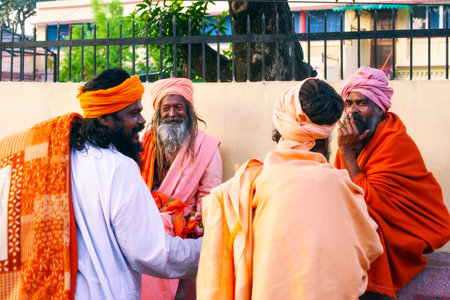 Rishikesh, Uttarakhand / India - December 1, 2019: Indian hindu devotee monks (sadhu) around famous Swarg Ashram in pilgrimage tourist spot Rishikeshのeditorial素材