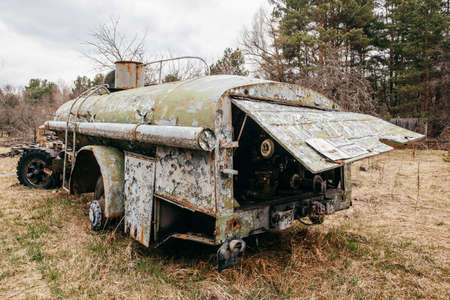 Old rusty abandoned Soviet fire truck in Chernobyl exclusion zone.の写真素材