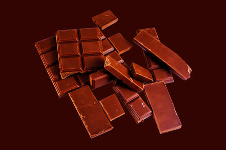 Fresh milk chocolated isolated on brown background