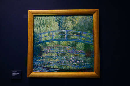 PARIS, FRANCE - October 2, 2016: Monet artwork in permanent collection hall of Musee d'Orsay. Musee d'Orsay has the largest collection of impressionist and post-impressionist paintings in the worldのeditorial素材