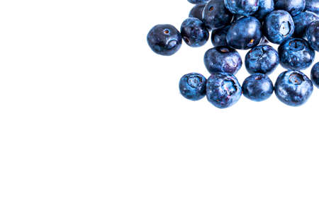 Fresh blueberries heap on whiteの写真素材