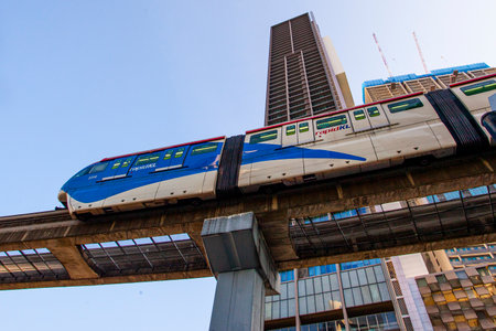 KUALA LUMPUR, MALAYSIA - January 21, 2020: KL Monorail train public transport passing through Bukit Bintang area. People can seen exploring around it.のeditorial素材