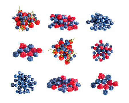Fresh summer blueberry, raspberry and strawberry heap, isolated