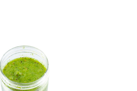 Fresh green smoothie isolated on white