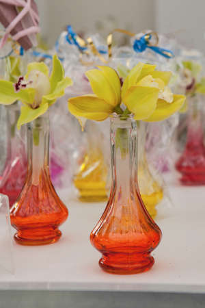 yellow flower in vaseの写真素材