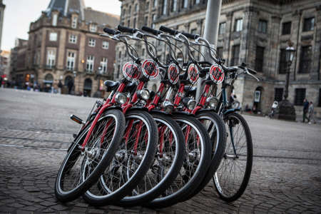 AMSTERDAM - MAY 13, 2015: Auckland waterfront bike hire.Many cities around the world have bicycle...