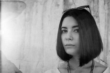 beautiful brunette woman with dark eyes portraitの写真素材