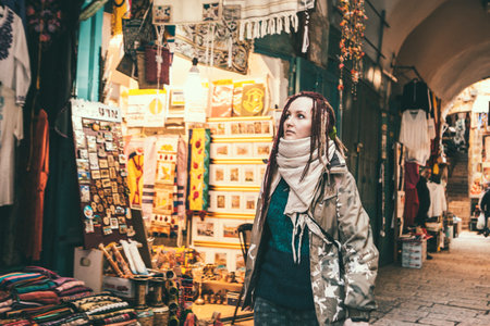 Tourist young woman at Jerusalem's old city market, Israel