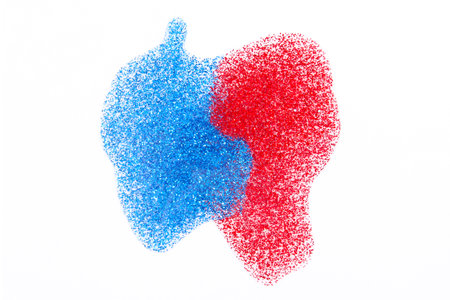 Red and blue shimmering nail polish on white background Red and blue shimmering nail polish on white...