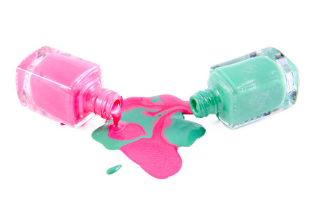 Close up of Spilled colorful nail polish - pink and light greenの写真素材