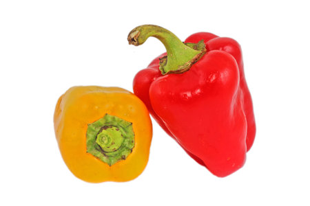 Red and yellow paprika pepper isolated on a white backgroundの写真素材
