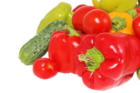 Fresh bright vegetables: papriks, tomato and cucumbersの写真素材