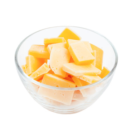 Slices of cheese in glass bowlの写真素材