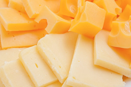 Assortment of different kinds of cheese, backgroundの写真素材