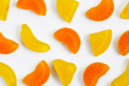 Fresh jelly fruit candies on the white backgroundの写真素材