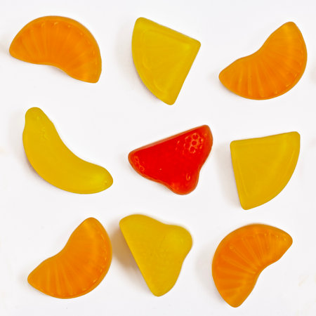 Fresh jelly fruit candies on the white backgroundの写真素材