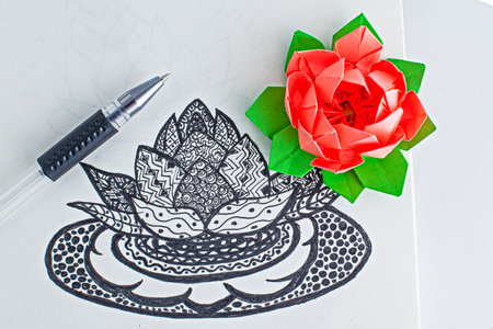 Origami lotus and lotus picture in graphics with ornamentsの写真素材