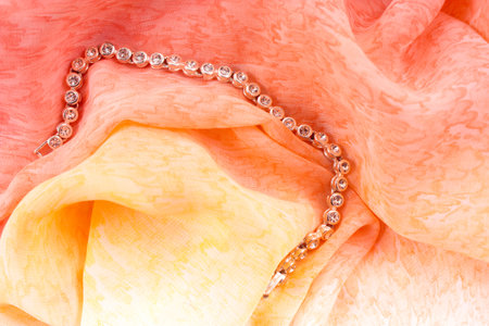 Beads on the rose textileの写真素材