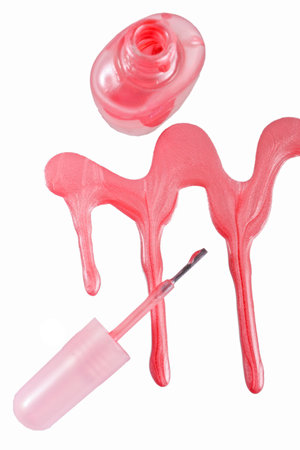 Bottle of the pink nail polish isolatedの写真素材