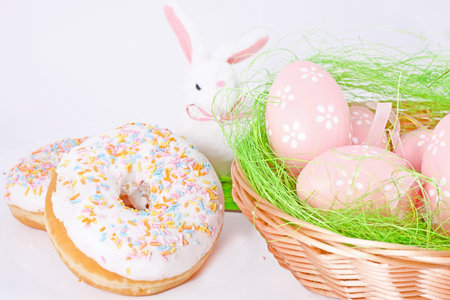 Easter eggs and rabbit on white backgroundの写真素材