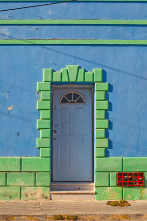 Colorful blue with green  houses of the downtown of Merida city in Mexicoの写真素材