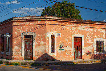 Merida, Yucatan , Mexico - 4 April , 2022: Small colonial style buildings at street of Merida city old town, Mexicoの写真素材