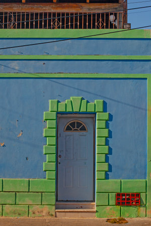 Colorful blue with green  houses of the downtown of Merida city in Mexicoの写真素材