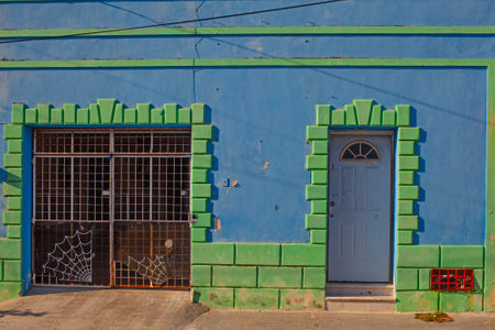 Colorful blue with green  houses of the downtown of Merida city in Mexicoの写真素材