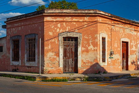 Small colonial style buildings at street of Merida city old town, Mexicoの写真素材