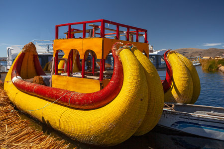 Uros, Peru - April 29, 2022: Traditional reed boat as transportation for tourists, Islas es los Uros, Lake Titicaca, Peruの写真素材