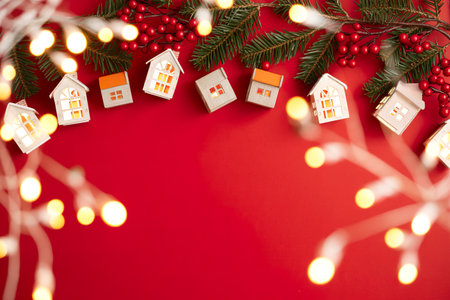 Christmas background with xmas tree branches, luminous Christmas lightsの写真素材