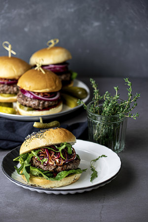 Homemade beef burgers for dinnerの写真素材