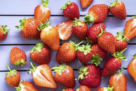 Strawberry on white wooden table top viewの写真素材