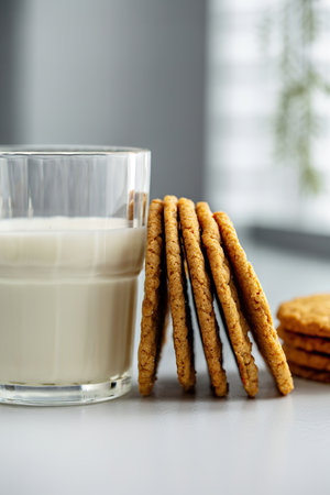 Chewy and thin snickerdoodle or molasses cookies with milkの写真素材