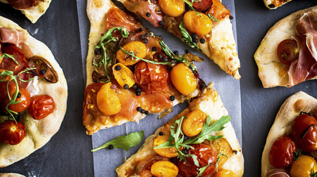 Homemade mixed tomatoes flatbread menuの写真素材