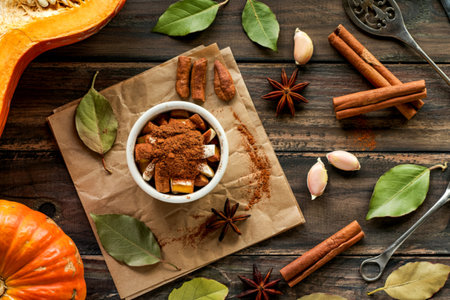 Pumpkin spice cinnamon on wood background, top view, healthy food conceptの写真素材