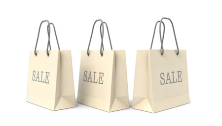 Three off-white shopping bags with gray rope handles are arranged in a row. Each bag displays the word SALE in a simple, sans-serif font.の写真素材