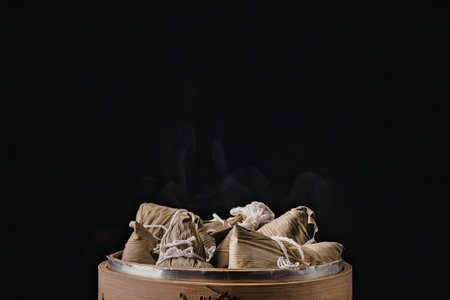 A close-up view of aromatic incense cones resting on a wooden holder against a dark backgroundの写真素材