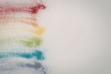 A vibrant rainbow on white paper with colored pencils or crayons, featuring a range of colors from...