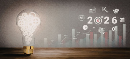 Bright glowing light bulb filled with gears alongside future growth projections and business strategy icons on a gray background symbolizing innovative ideas and progress.の写真素材
