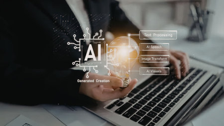 Business professional holding lightbulb while using laptop, symbolizing artificial intelligence and...