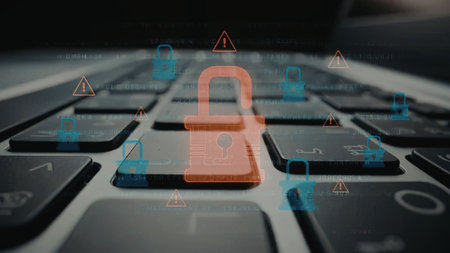 Red padlock on laptop keyboard surrounded by blue padlocks and warning signs symbolizing...