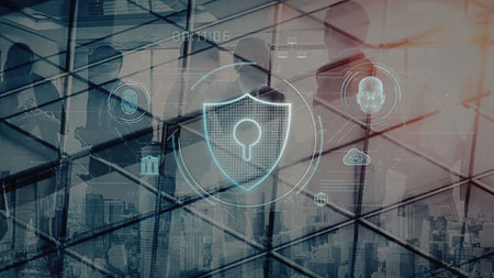 Cybersecurity protection system with glowing shield icon on a modern office building background...