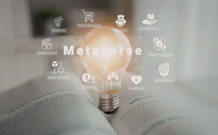 Illuminated lightbulb on an open book with metaverse icons symbolizing futuristic technology and virtual experiences.の写真素材