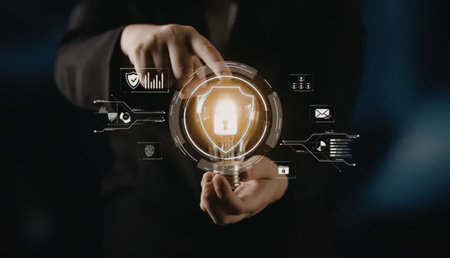 Person holds a glowing light bulb surrounded by digital security icons and futuristic interfaces in...
