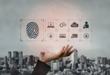 Hand holding a glowing digital security interface displaying various icons for data protection and...